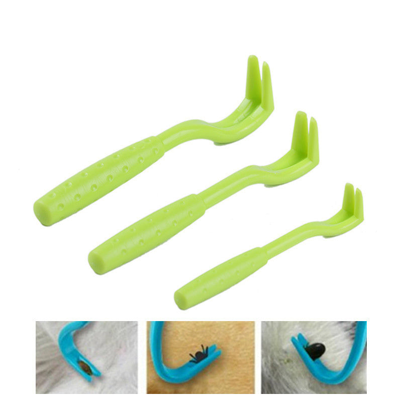 Close-up of three green pet flea removal hooks with textured handles, designed for safe and effective pet grooming tools